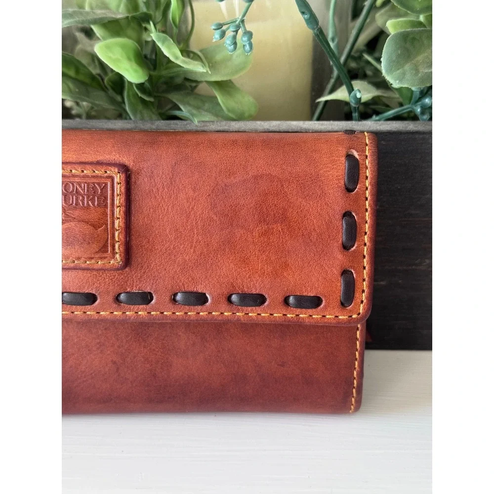 Dooney & Bourke whipstitch style